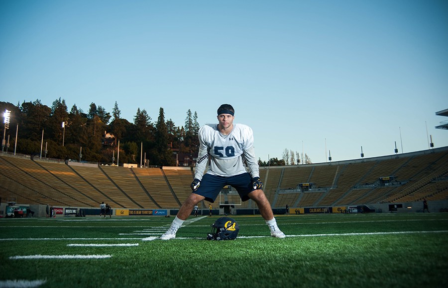 Jordan Kunaszyk standing on the football field